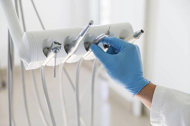 Professional Root Canal Treatment technician working in Alamance, NC